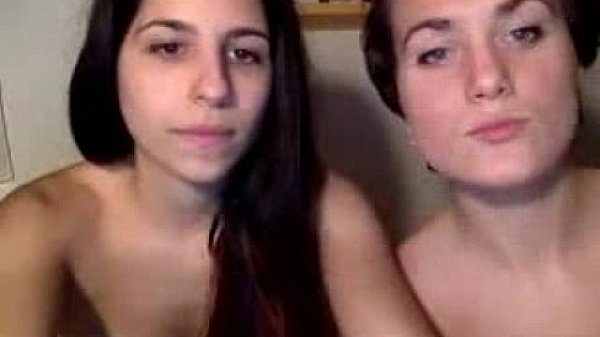 Two busty amateur lesbians having some naughty fun together