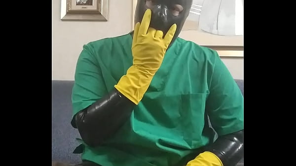 Rubber surgeon masturbating  