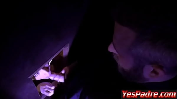 Priest and Catholic boy in the confessional  