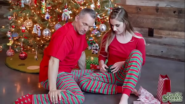 Niki sucked stepdads cock beside the glimmering tree and gagged on his tip so nicely 