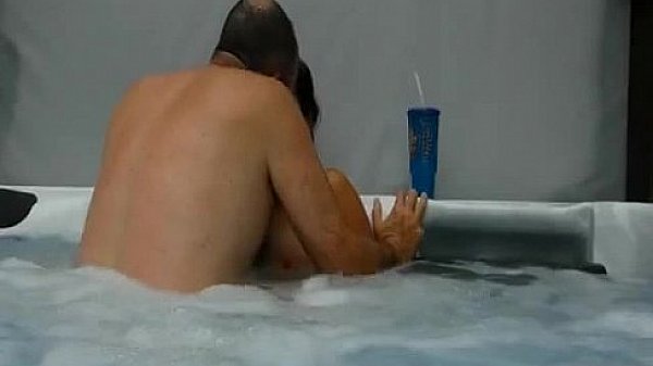 Mature couple having an amazing sex experience in their pool