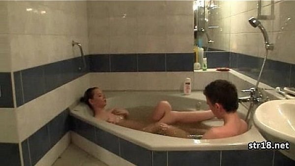 Amateur teen couple fucks in parents bed