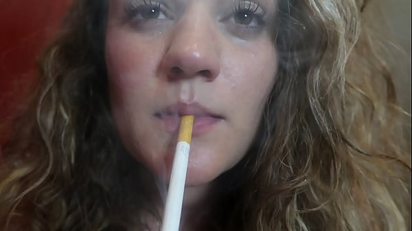 blonde teen does a nice suck to a toy while smokes!