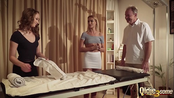 Old man gets oil massage from two beautiful teen girls and they fuck him