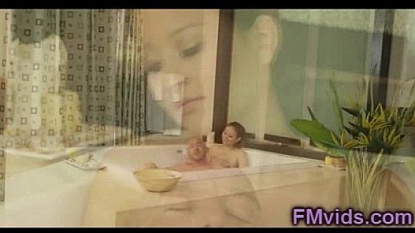 Beautiful brunette bathtub sucking
