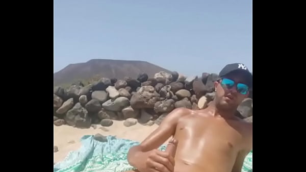 Handjob at beach  
