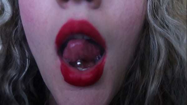 girl with painted lips a cigar she have bigboobs