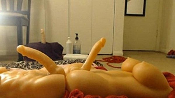 Busty playing with two dildos