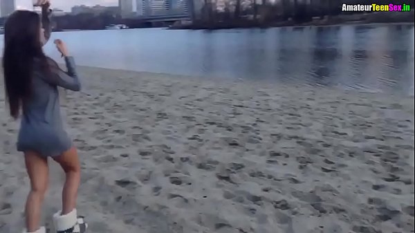 Brunette shameless naked near the river