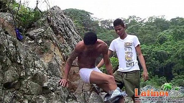 Two hunky Latino boys sucking cocks in the rocks  
