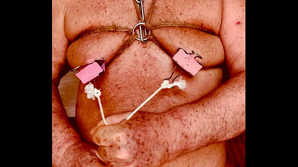 Seniormasochist pulls nipple clamps off  