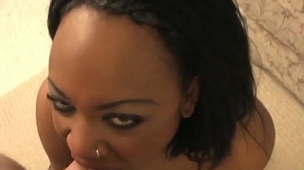 Black girl in stockings strokes a cock