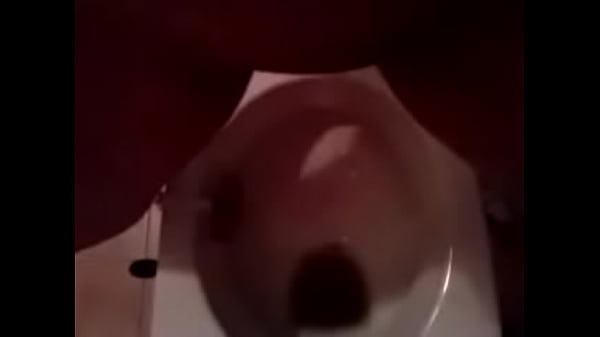 piss standing above toilet