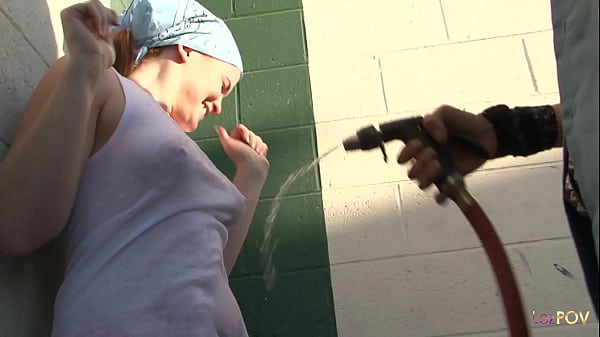 Blonde butchy looking car mechanic is teaching her apprentice a thing or two about fixing cars. Once she pours water from a hose on her, passions fair up and they end up lesbian fucking.
