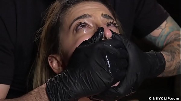 Master Tommy gags blonde slave Kristen Scott in chair bondage then bangs her mouth while she is hung in upside down position later fucks her pussy with big cock