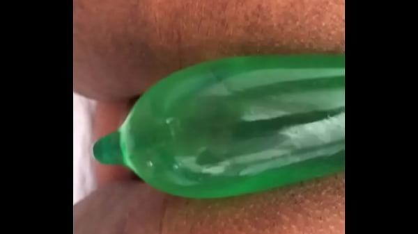 Removing a rubber filled with piss from ebony&rsquo;s pussy  