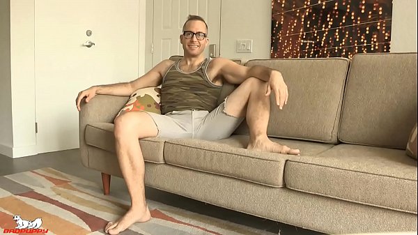 Joel spreads his ass showing off his tight, furry ass.  He licks his fingers and begins teasing his hole with one hand and jerking his thick piece of meat with the other.  Joel tells us that he's not got off in four days and is ready to blow ...