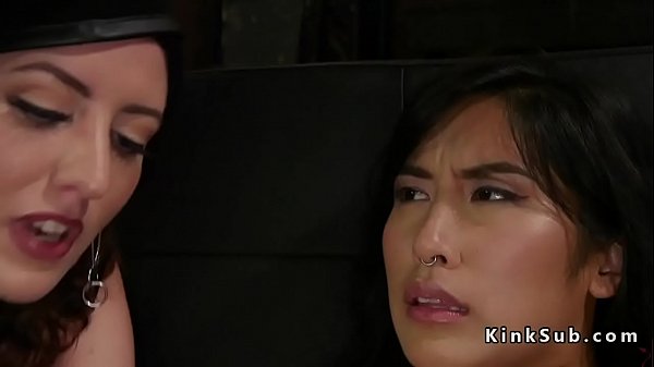 Pierced Asian slave butt plugged in threesome