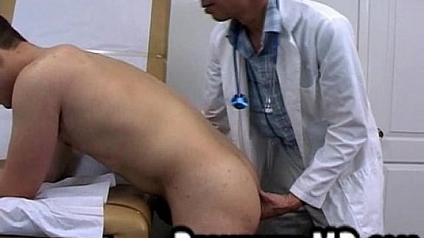A handjob is given to the stud patient by the doctor  