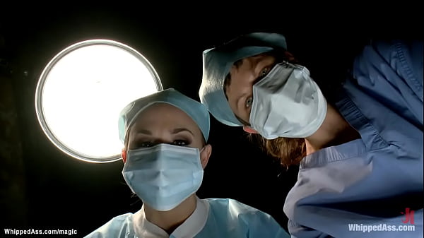 Strapped and gagged in medical chair brunette lesbian patient Cassandra Nix is dominated by doctor in latex Chanel Preston then spanked in suspension 