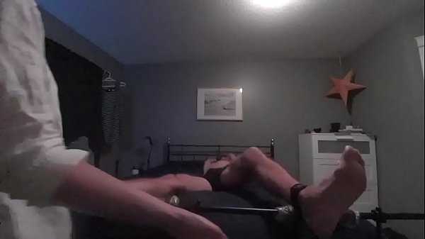 Brittany sucks and tickles her boyfriends tied up toes, until he orgasms