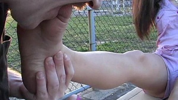 Hot girl get her feet worshiped in Public