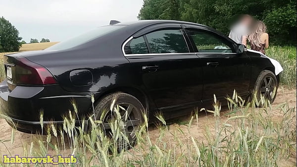 sexy hot wife in a photo session near the car  