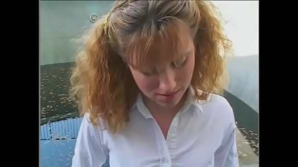 Naughty redhead babysitter gets fucked from behind while sucking a black cock