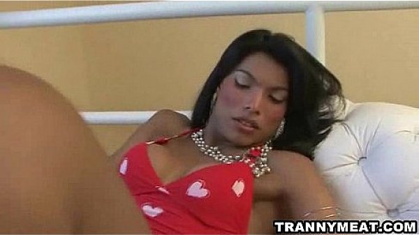 She has big tits and a big latina dick that she tuggs on