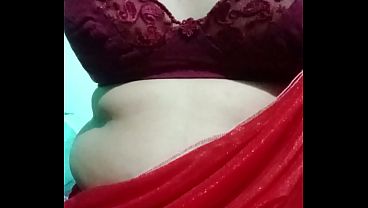Indian Gay Crossdresser Bottom Gaurisissy pressing her big boobs and feeling horny in red saree with heavy jwellery