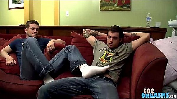 He gives his good buddy a nice foot wank and makes him cum