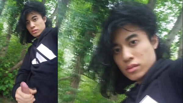 Asian gay twink masturbates, precum comes out of his erect penis, sexy guy ejaculates cum outdoors in rainy weather and birdsong by the river Jon Arteen shoots a gay porn video for fans who love handsome twink Asian boys The young guy masturbates penis 