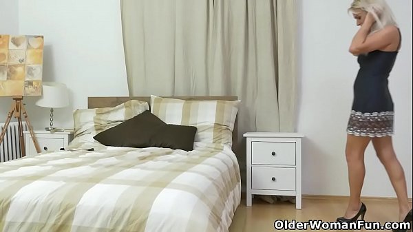 European mom Kathy strips off her lingerie and gives her needy cunt a treat