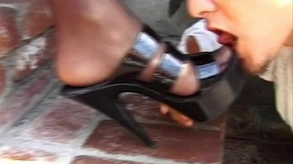 Busty blonde gives outdoor footjob