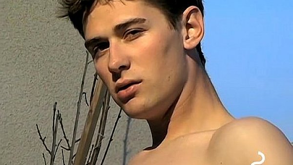 Slender Shane shows off his penis while on the balcony