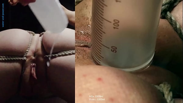 Violet and Slave Mila have a blindfolded race to see who can take and hold the most enema water  