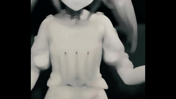 A cheerful Genshin girl waves with a bright smile, her aqua hair glowing under the lights. Sweet and innocent on the surface, but her charm hides a deeper magic&hellip; bio link waiting