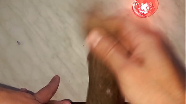 I drip wax onto my long tattooed foreskin, which makes me aroused and my penis gets hard.