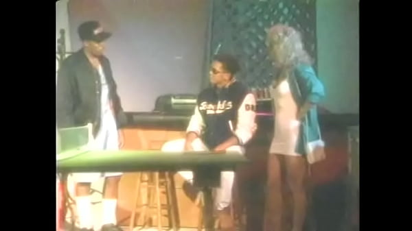 Black guy licks gorgeous blonde's wet pussy and fucks her doggy style in a bar  