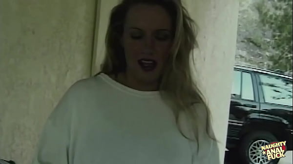 A large cock is inserted deep within the asshole of a dirty blonde chick.