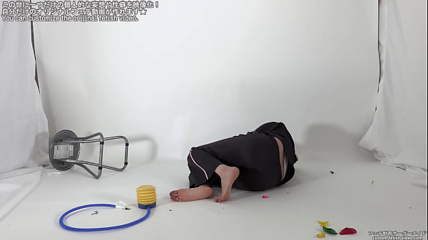 A woman screaming by popping a balloon