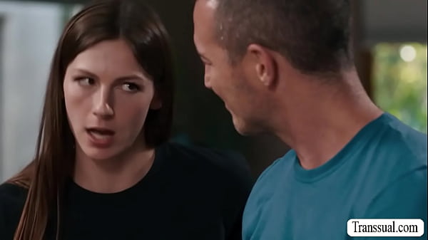 Derek Kage brings flower for brunette TS Amanda Riley and they start kissing each other on the bed.