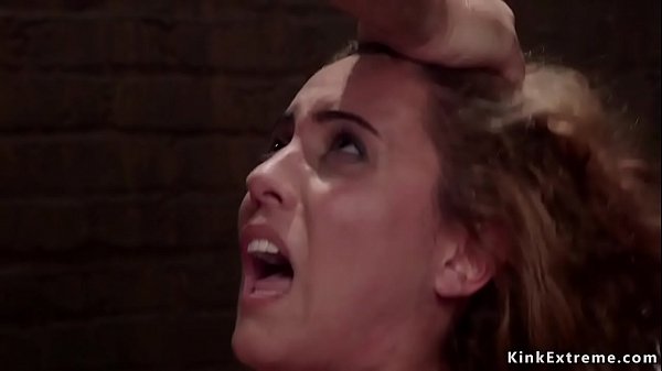 Ginger haired slave Roxanne Rae in standing bondage with hands behind back gets hot ass spanked then mouth and ass fucked by big cock slave trainer 