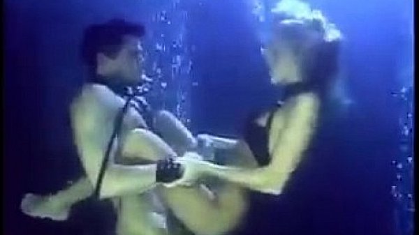 Sandy Knight and Robyn Foster in a threesome underwater
