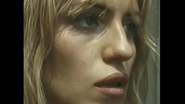 Crazy redhead bitch ties a slender brunette to the cross and hangs clothespins on her nipples