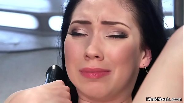 Small tits dark haired beauty shoves fucking machine in pussy