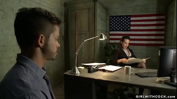 Corrupted brunette shemale agent TS Foxxy takes cock of Turk Mason who is applied for citizenship and sucks him then anal fucks his tight ass 