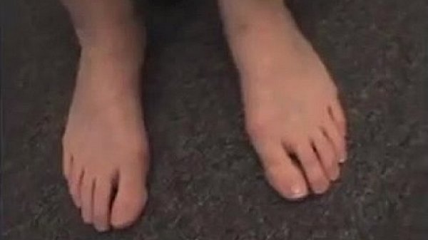 Mature Woman Teasing Her Pretty Feet