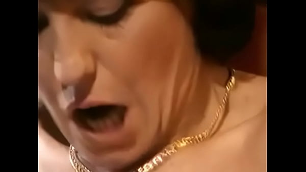 Vintage busty milf enjoying a huge cock