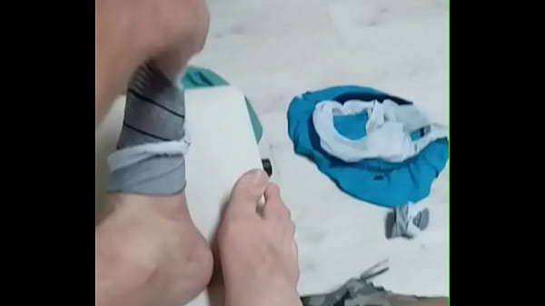 exy Tom Motho is wanking in his gymroom on the training bench